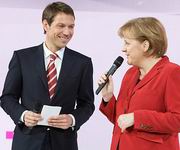Renè Obermann e Angela Merkel    